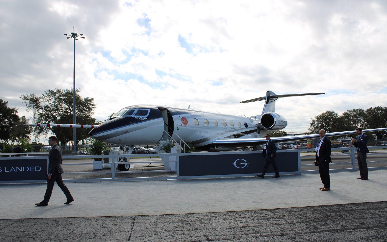 Editorial illustration of an ultra-long-range business jet at altitude