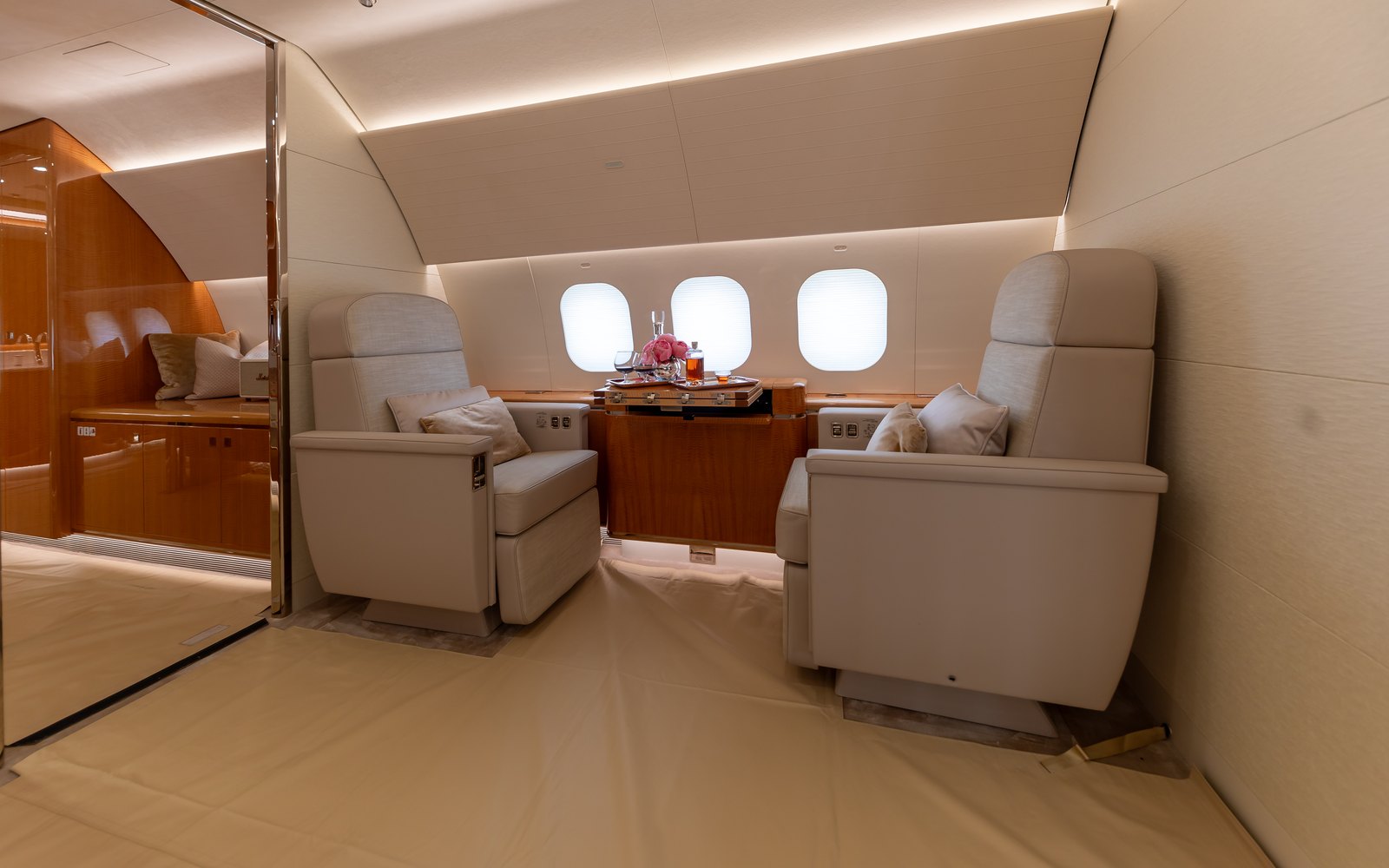 Editorial illustration of a luxurious private jet cabin interior