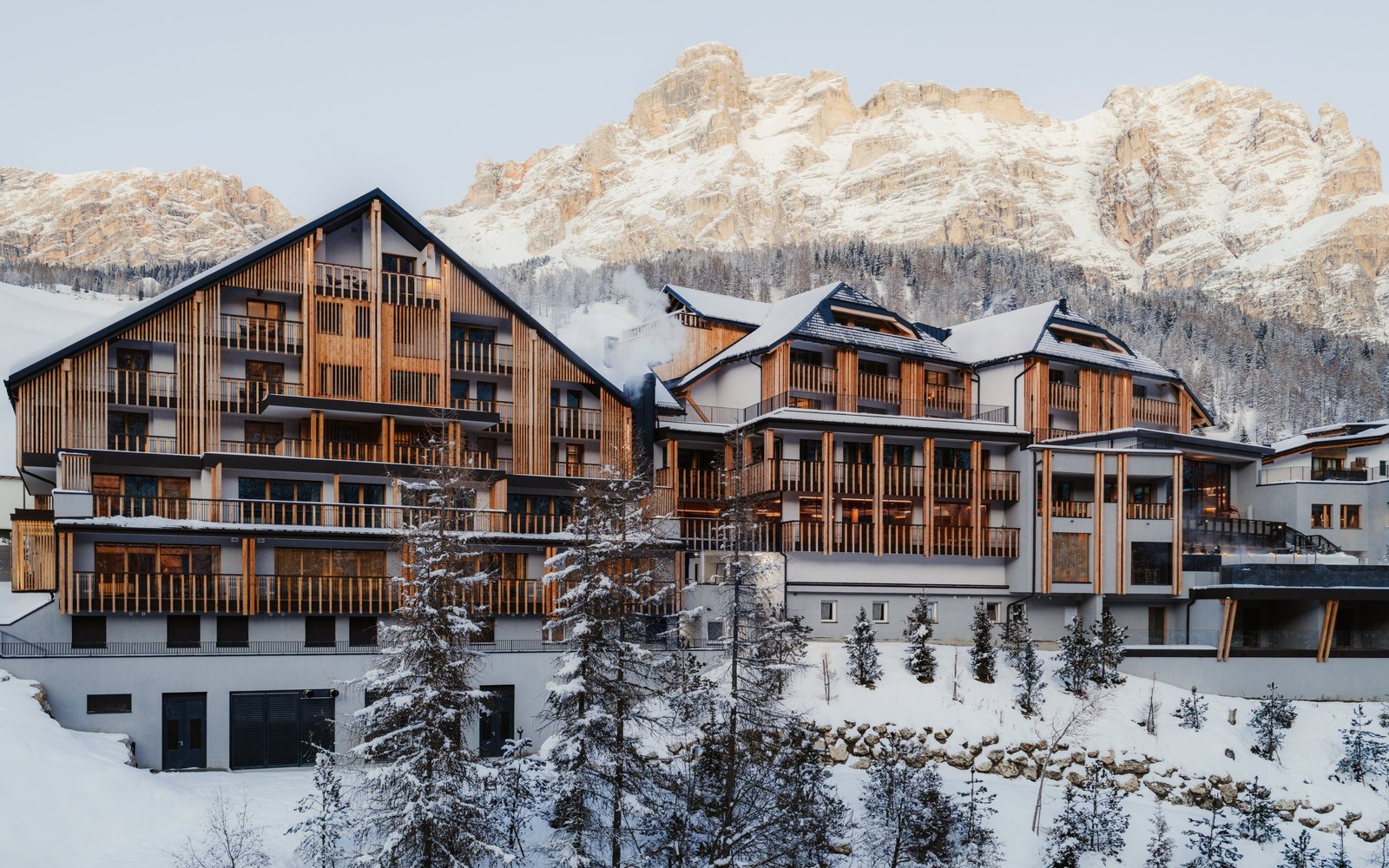 Editorial illustration of an alpine lodge in the Dolomites at dusk