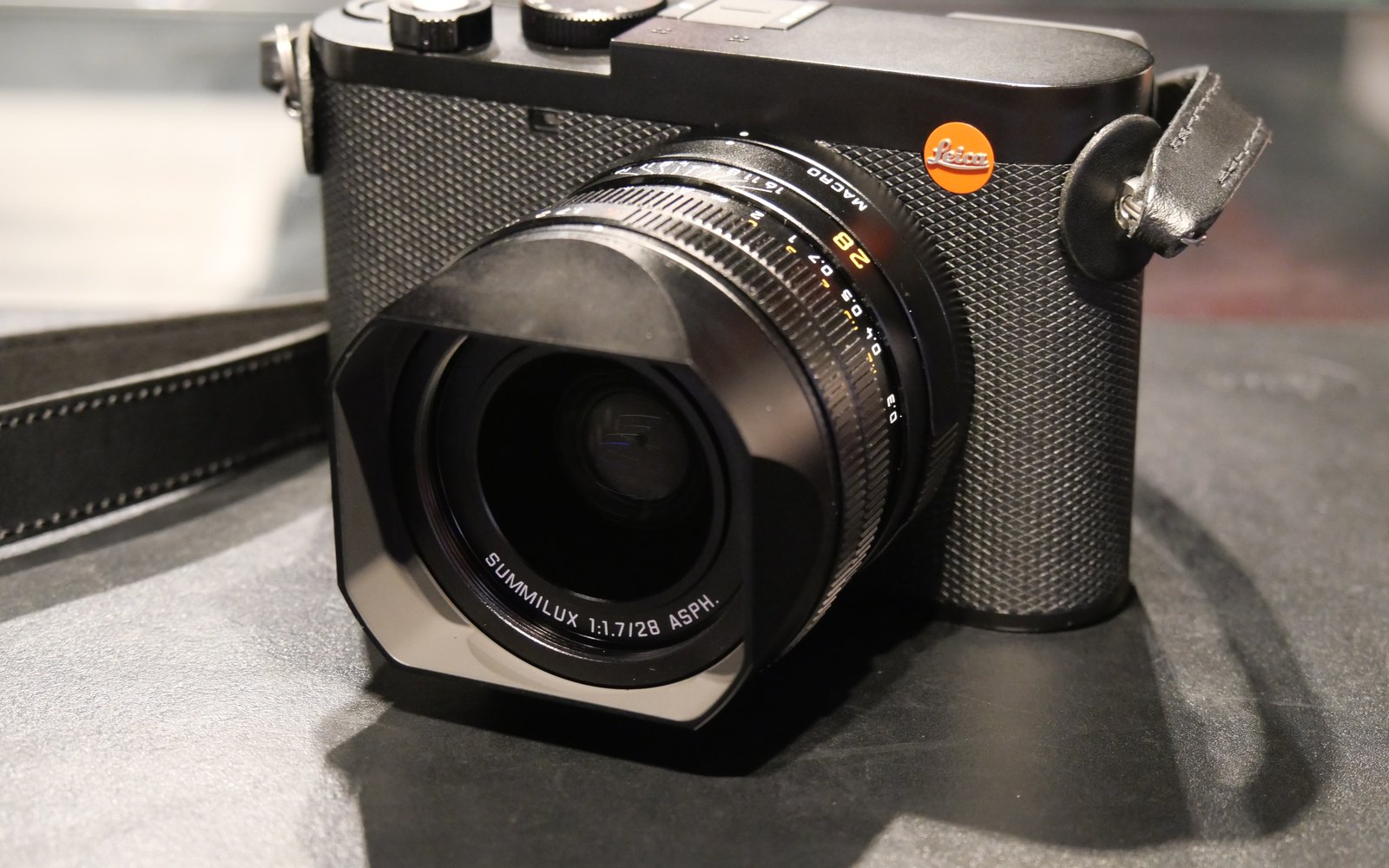 Editorial illustration of a premium compact camera